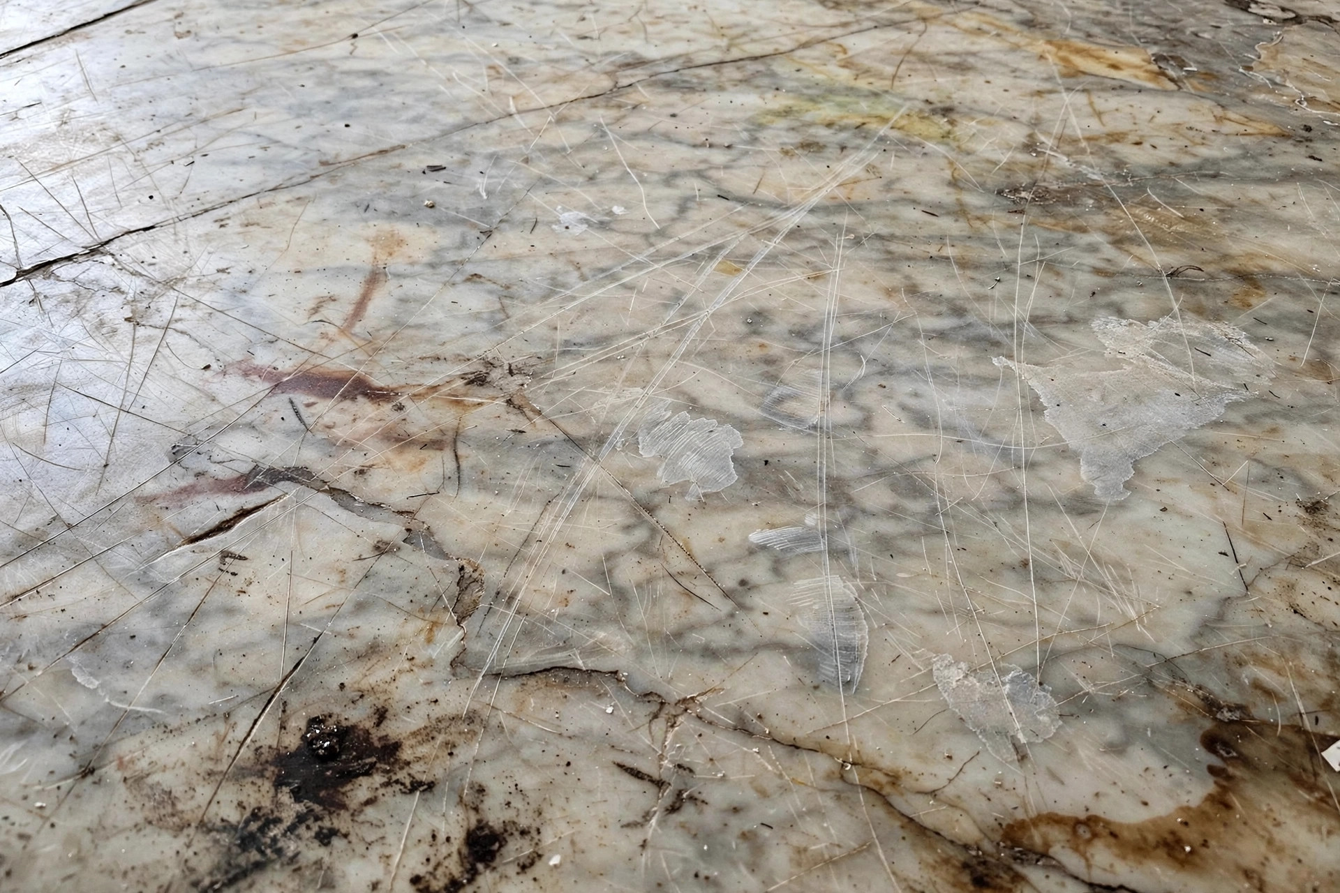 Old damaged marble floor before professional restoration New Orleans